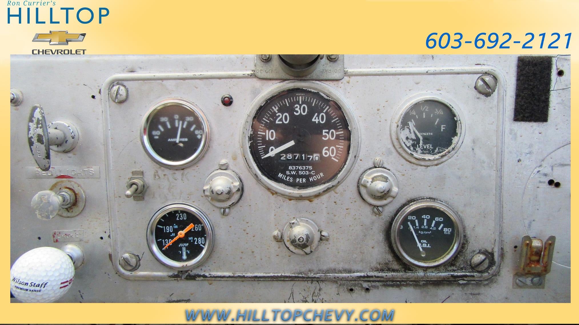 Dashboard with various gauges including a speedometer and odometer.