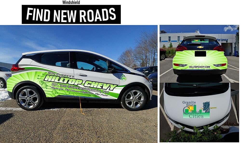 A white car with green graphics and text advertising Hilltop Chevy and Granite State Clean Cities.The car is shown from the side, rear, and close-up of the rear bumper.